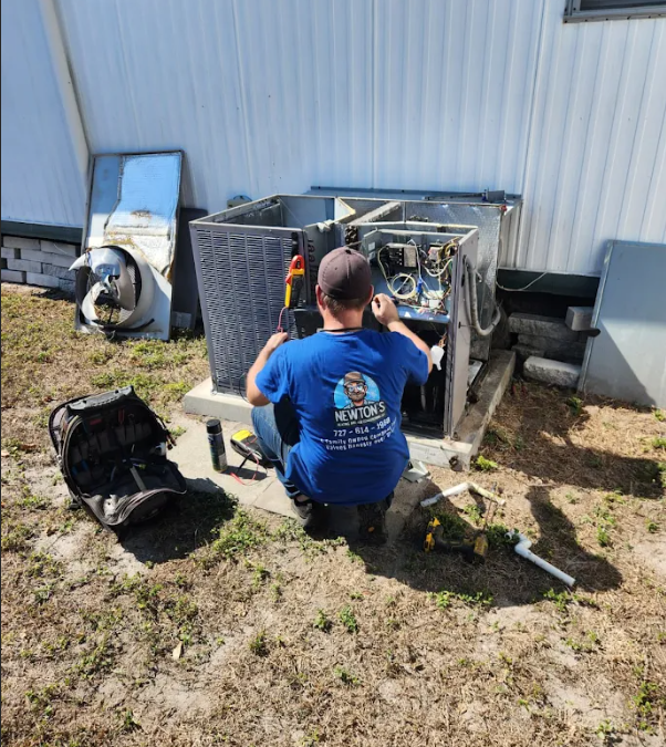 HVAC Technician Repairing AC unit